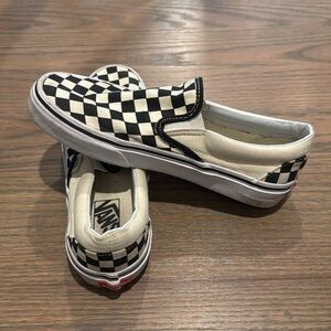 Vans Black and White Checkerboard Slip-On Sneakers